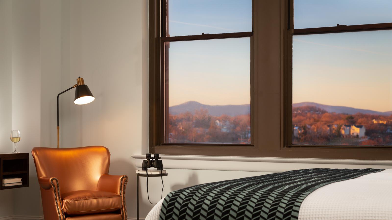 Corner room with bed and view outside window